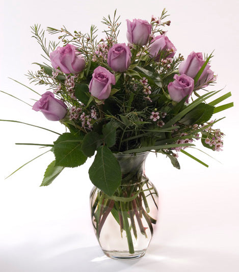 12 Premium Violet Roses in a Vase with Greens